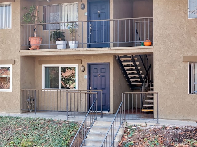 property entrance with a balcony