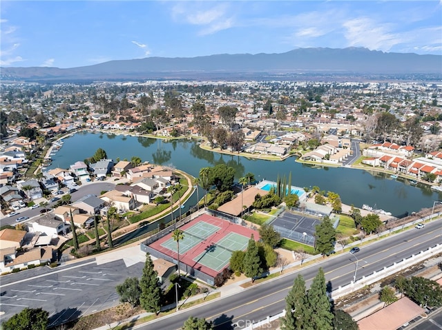 bird's eye view with a water and mountain view