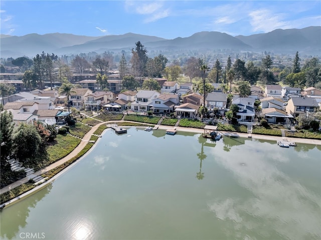 aerial view with a water and mountain view