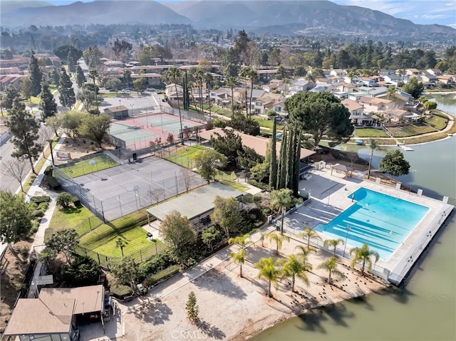 bird's eye view featuring a water and mountain view