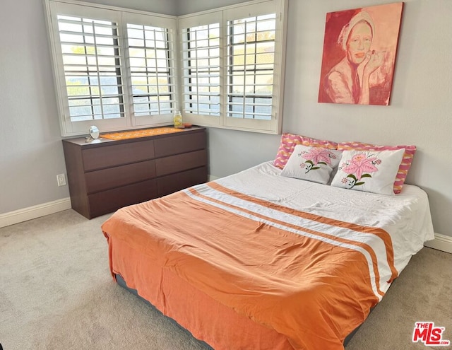 bedroom featuring carpet flooring