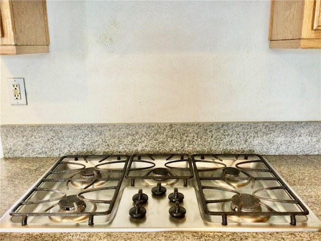 details with stainless steel gas stovetop