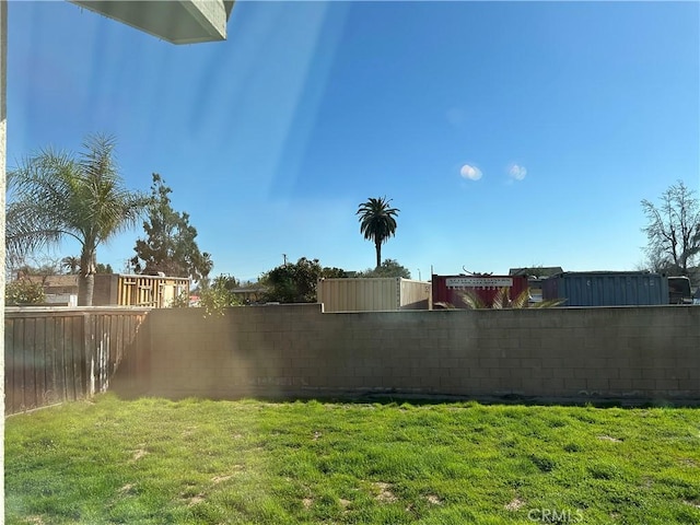 view of yard featuring a fenced backyard