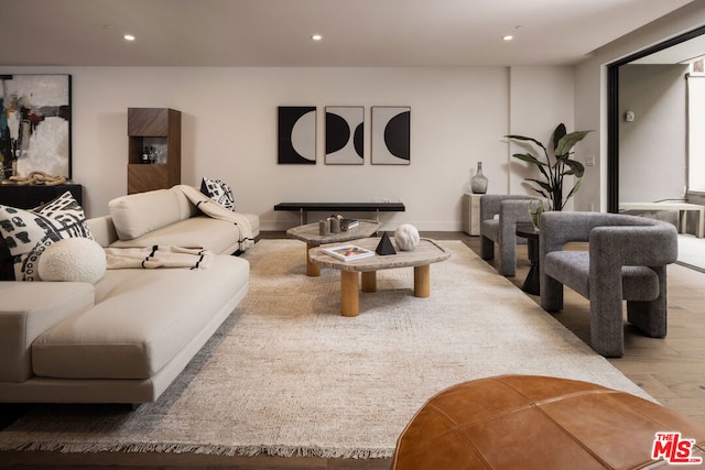 living room with light hardwood / wood-style flooring