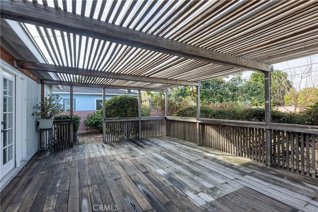 wooden terrace with a pergola