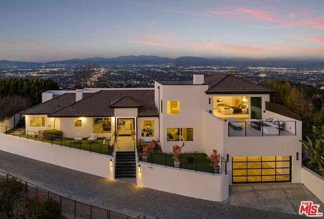 view of front of property with a mountain view