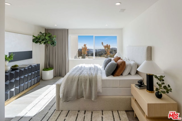 bedroom with light wood-type flooring