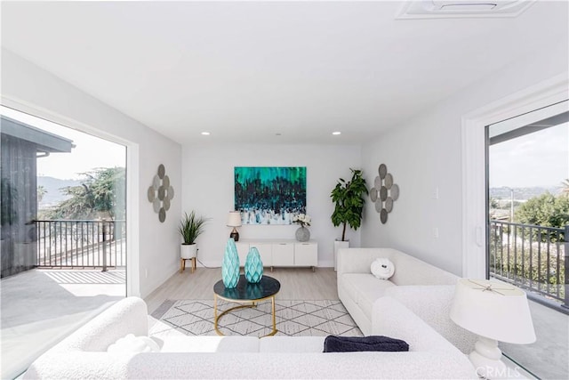 2926 Future St, Los Angeles, CA 90065 - living room with healthy amount of natural light, light wood finished floors, and recessed lighting