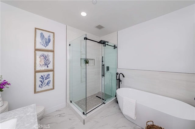 2926 Future St, Los Angeles, CA 90065 - bathroom featuring toilet, a freestanding bath, recessed lighting, marble finish flooring, and a stall shower