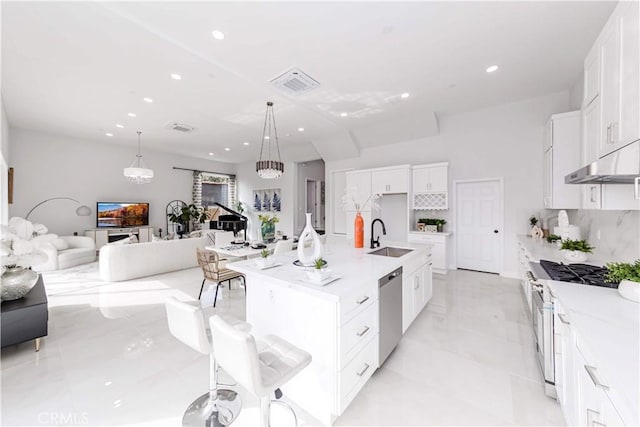 2926 Future St, Los Angeles, CA 90065 - kitchen featuring stainless steel appliances, open floor plan, a sink, white cabinetry, and recessed lighting
