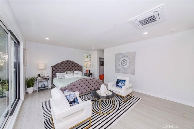 bedroom with light wood-type flooring