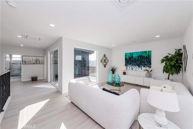 2926 Future St, Los Angeles, CA 90065 - living room featuring light wood-style flooring, recessed lighting, and baseboards