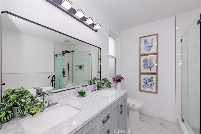 bathroom with vanity, toilet, and walk in shower