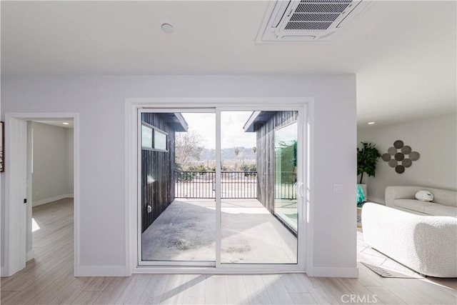 2926 Future St, Los Angeles, CA 90065 - doorway with baseboards and light wood finished floors