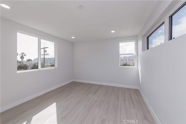 2926 Future St, Los Angeles, CA 90065 - empty room featuring light wood finished floors, baseboards, and recessed lighting