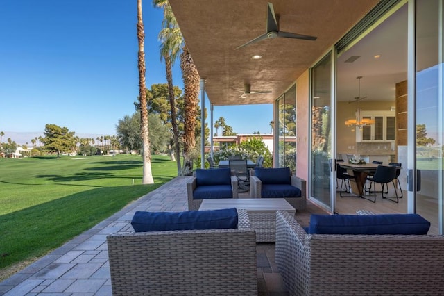 view of patio / terrace featuring outdoor lounge area and ceiling fan