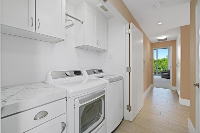 laundry room with washer and clothes dryer