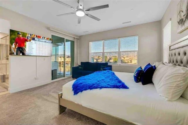 carpeted bedroom with ceiling fan, multiple windows, and access to outside