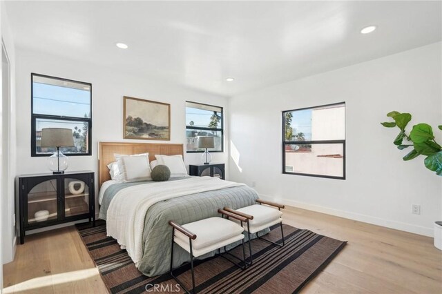 bedroom featuring light hardwood / wood-style floors