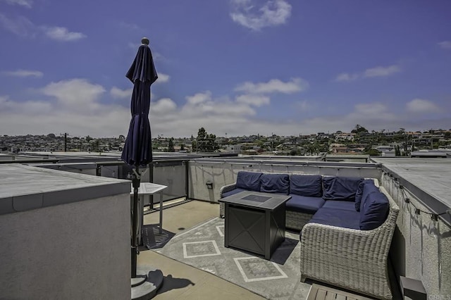 view of patio / terrace featuring an outdoor fire pit