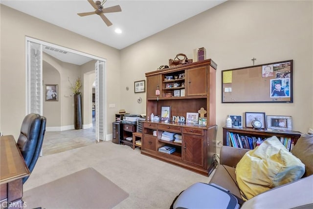 office featuring light colored carpet and ceiling fan