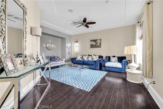 living room with ceiling fan and wood-type flooring