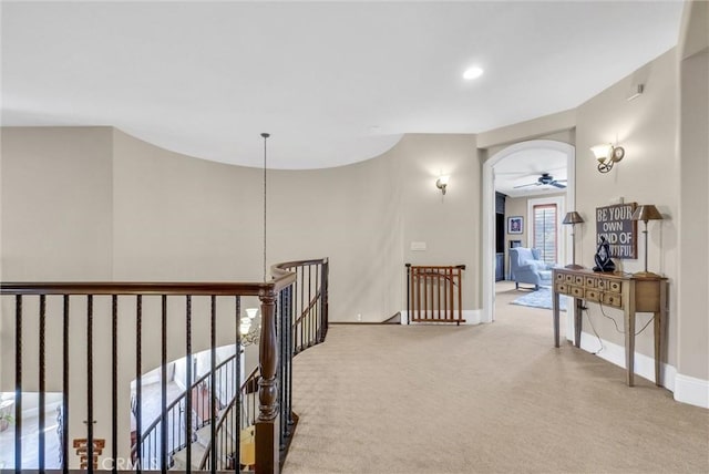 hallway with carpet flooring