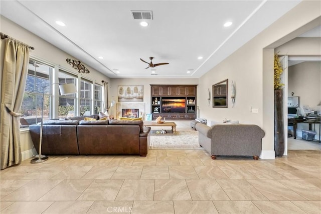 living room featuring ceiling fan