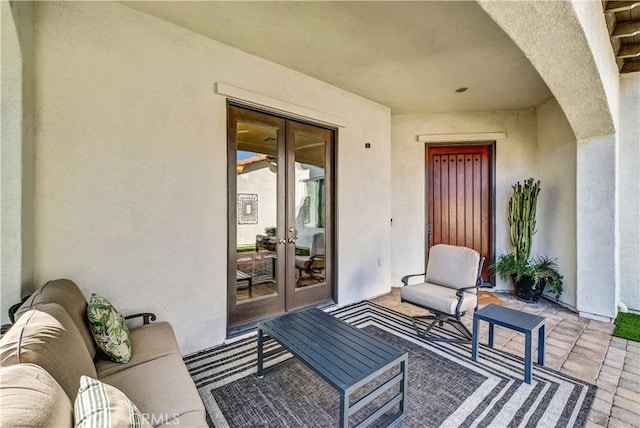 property entrance with french doors and a patio