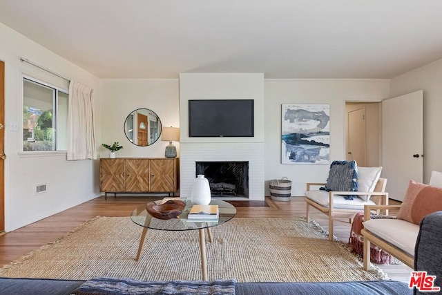 living room with hardwood / wood-style flooring