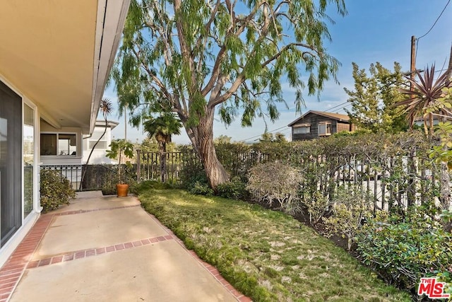 view of yard with a patio area