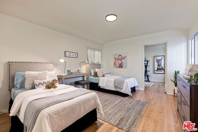 bedroom featuring light wood-type flooring