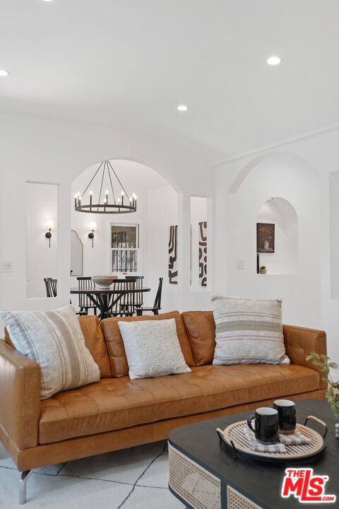 living room featuring a chandelier