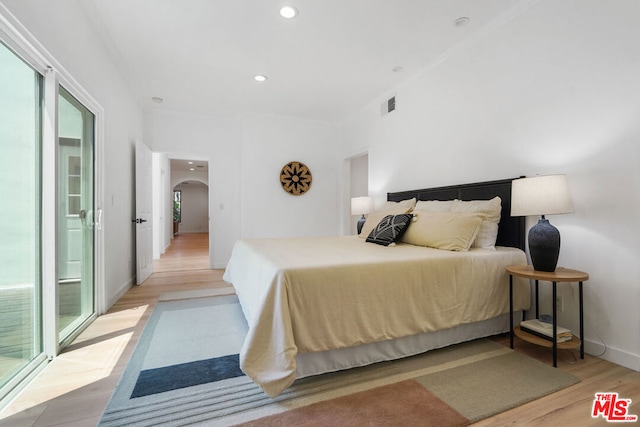 bedroom featuring light hardwood / wood-style flooring