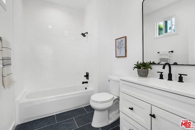 full bathroom featuring vanity, toilet, tile patterned flooring, and shower / bathing tub combination