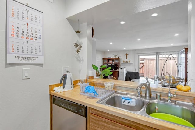 kitchen with sink and stainless steel dishwasher