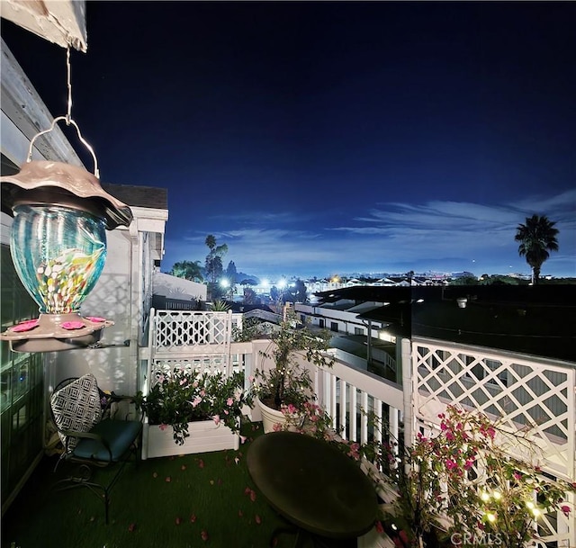 view of balcony at night