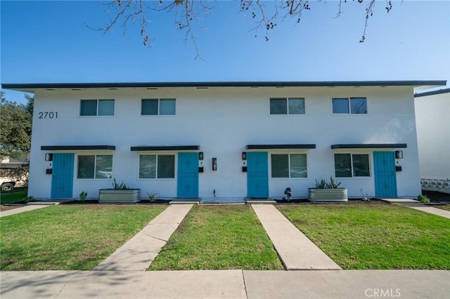 view of front of home with a front yard