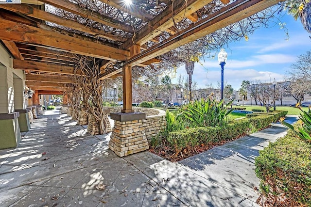 view of patio featuring a pergola