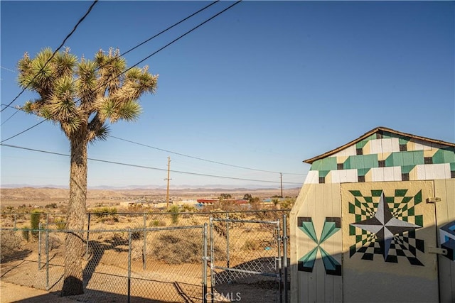 view of yard with a rural view