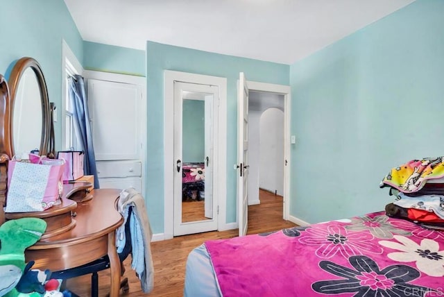 bedroom with light wood-type flooring