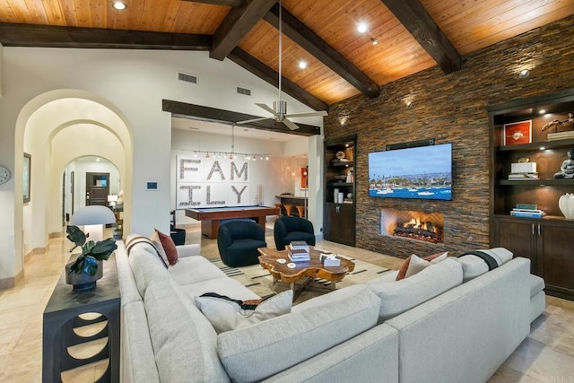 living room featuring built in shelves, billiards, wood ceiling, beamed ceiling, and a fireplace