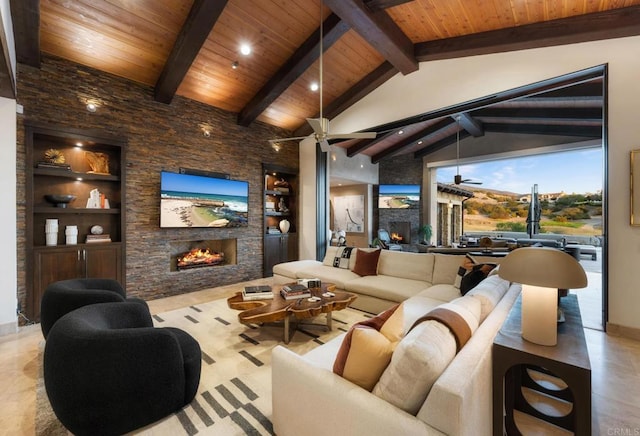 living room with wood ceiling, a fireplace, built in shelves, and beamed ceiling