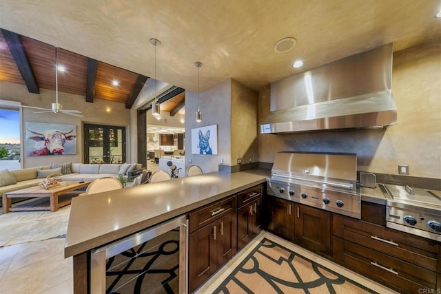 kitchen featuring pendant lighting, ventilation hood, beverage cooler, kitchen peninsula, and wooden ceiling