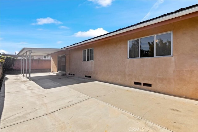 view of home's exterior featuring a patio