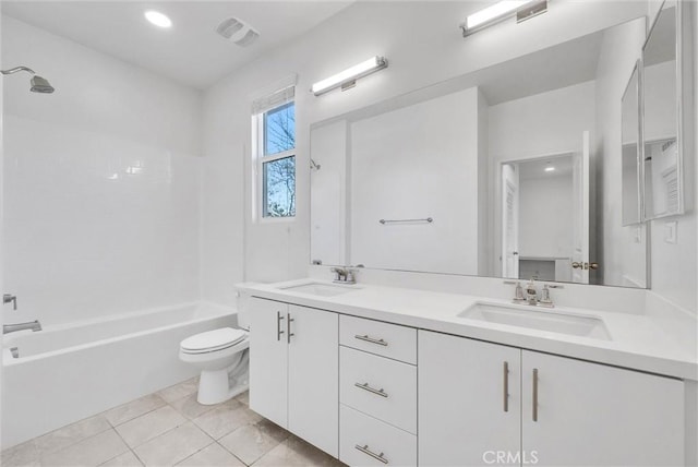 full bathroom with vanity, bathing tub / shower combination, and toilet