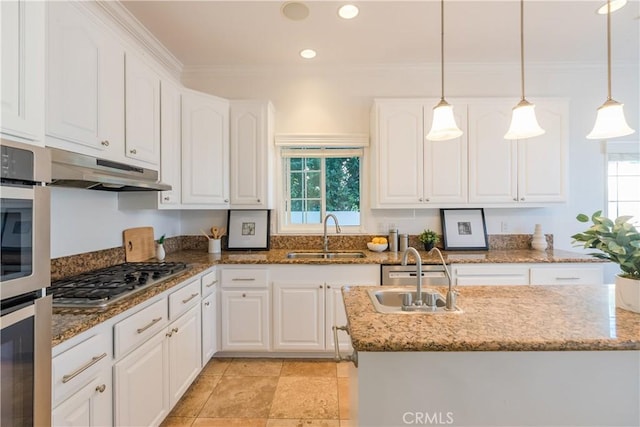 kitchen with white cabinetry, stainless steel gas cooktop, and sink