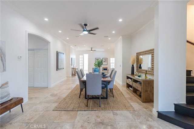 dining area featuring crown molding