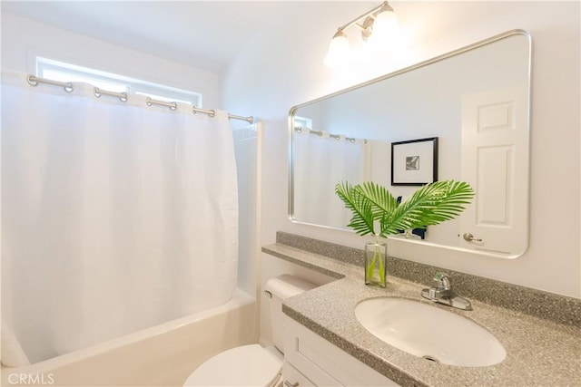 full bathroom featuring vanity, shower / bath combination with curtain, and toilet