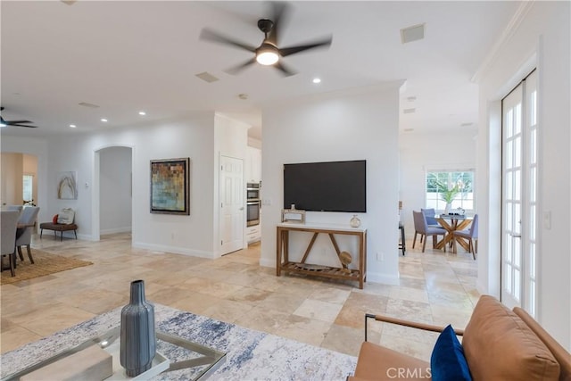 living room featuring ceiling fan